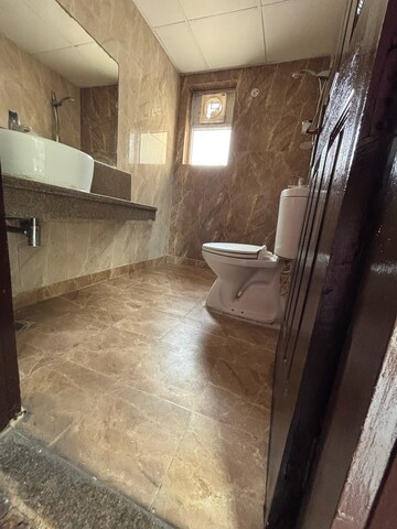 Bathroom in 1 BHK Apartment at Radhey Krishna Casa Green I, Sector 16 Greater Noida – for Rent