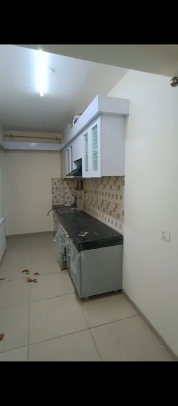 Kitchen in 2 BHK Apartment at Wave Dream Homes, Wave City – for Rent