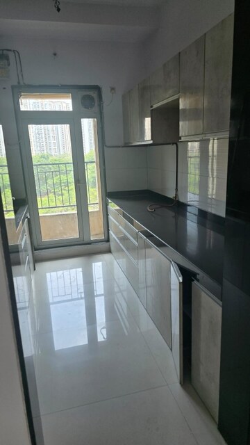 Kitchen in 2 BHK Apartment at Piramal Vaikunth, Balkum Pada – for Rent