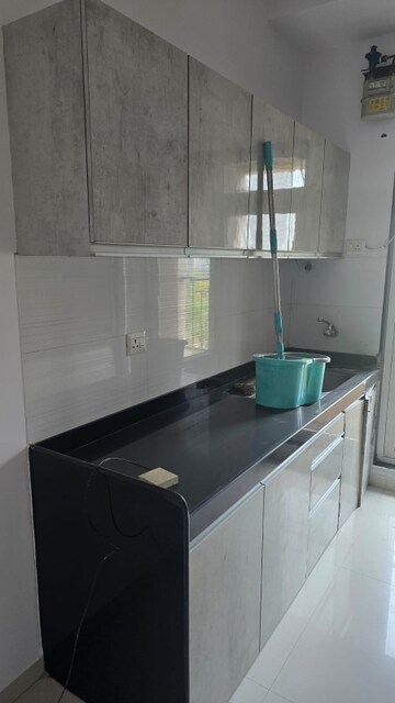 Kitchen in 2 BHK Apartment at Piramal Vaikunth, Balkum Pada – for Rent
