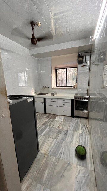 Kitchen in 2 BHK Apartment at Kalpataru Yugdharma, Malad West – for Rent
