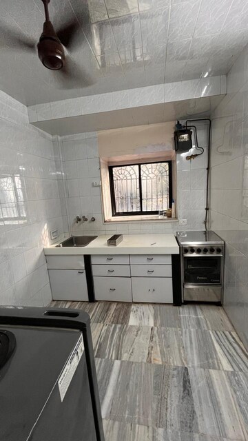 Kitchen in 3 BHK Apartment at Atul Blue Orbit, Malad West – for Rent