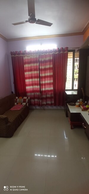 Living Room in 1.5 BHK Apartment at Kalyan West – for Sale