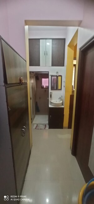 Living Room in 1.5 BHK Apartment at Kalyan West – for Sale