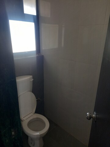 Bathroom in 3 BHK Apartment at Puravankara Silversands, Mundhwa – for Rent