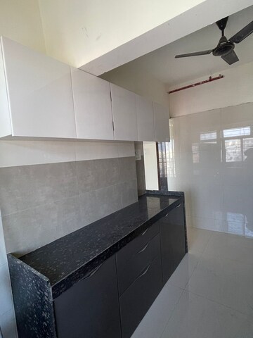 Kitchen in 4 BHK Apartment at Varad Heights, Tilak Nagar – for Sale