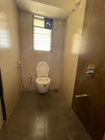 Bathroom in 4 BHK Apartment at Varad Heights, Tilak Nagar – for Sale