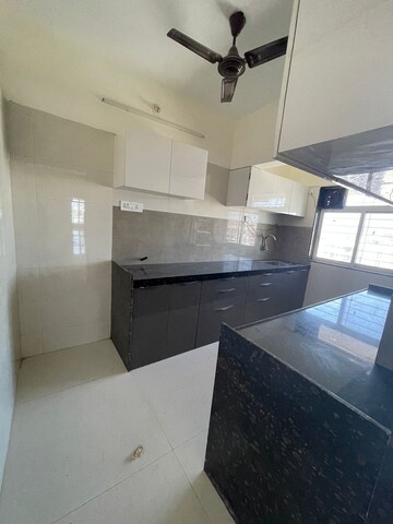 Kitchen in 4 BHK Apartment at Varad Heights, Tilak Nagar – for Sale