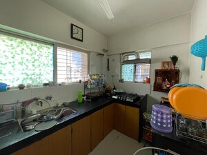 Kitchen in 2 BHK Apartment at Ganga Alfa Paradise, Wagholi – for Sale