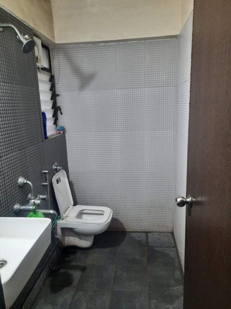 Bathroom, mantra-fifth-avenue 2 Bedroom 847 Sq.Ft. Apartment In Udhyog Nagar Pune 8624309
