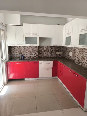 Kitchen in 2.5 BHK Apartment at Aims Golf City, Sector 75 – for Sale