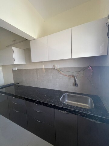 Kitchen in 4 BHK Apartment at Varad Heights, Tilak Nagar – for Sale