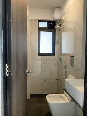 Bathroom in 2 BHK Apartment at Dev Leo Tower, Oshiwara – for Rent