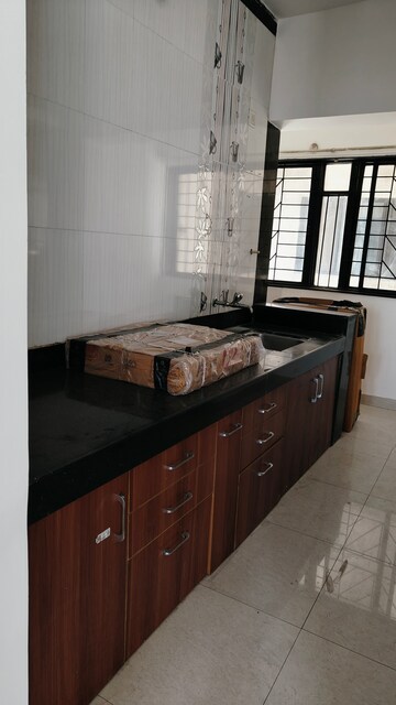 Kitchen in 2 BHK Apartment at Magarpatta City Roystonea, Hadapsar – for Rent
