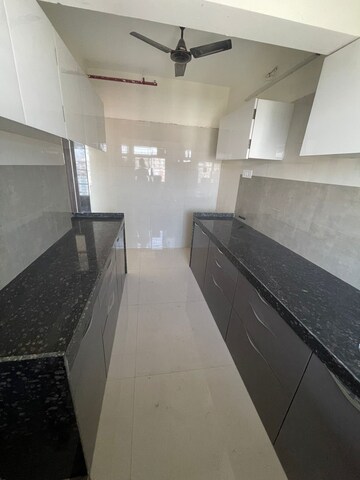 Kitchen in 4 BHK Apartment at Varad Heights, Tilak Nagar – for Sale
