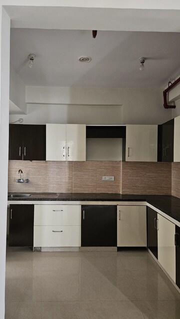 Kitchen in 3 BHK Apartment at Rishita Manhattan, Gomti Nagar – for Rent