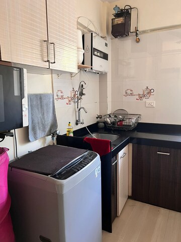 Kitchen in 2 BHK Apartment at Grenville CHS, Andheri West – for Rent