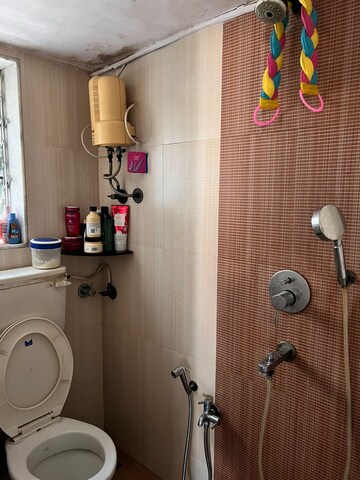 Bathroom in 2 BHK Apartment at Grenville CHS, Andheri West – for Rent