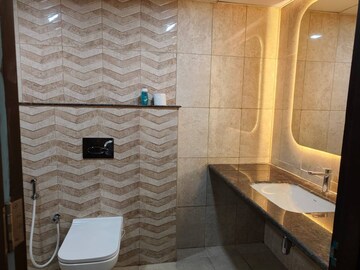 Bathroom in 3 BHK Apartment at Pashmina Waterfront, Old Madras Road – for Rent