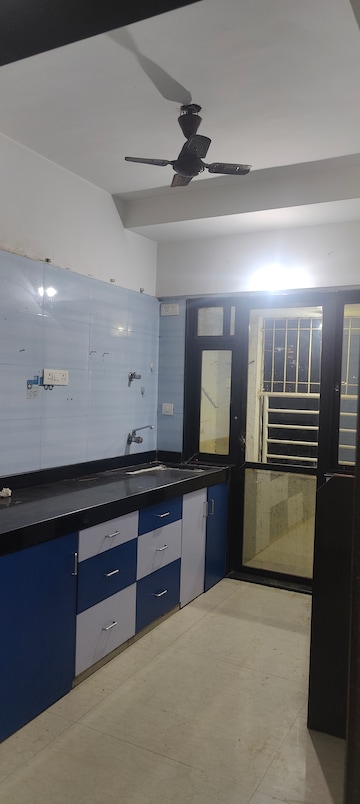 Kitchen in 2 BHK Apartment at Atul Blue Monarch, Andheri East – for Rent