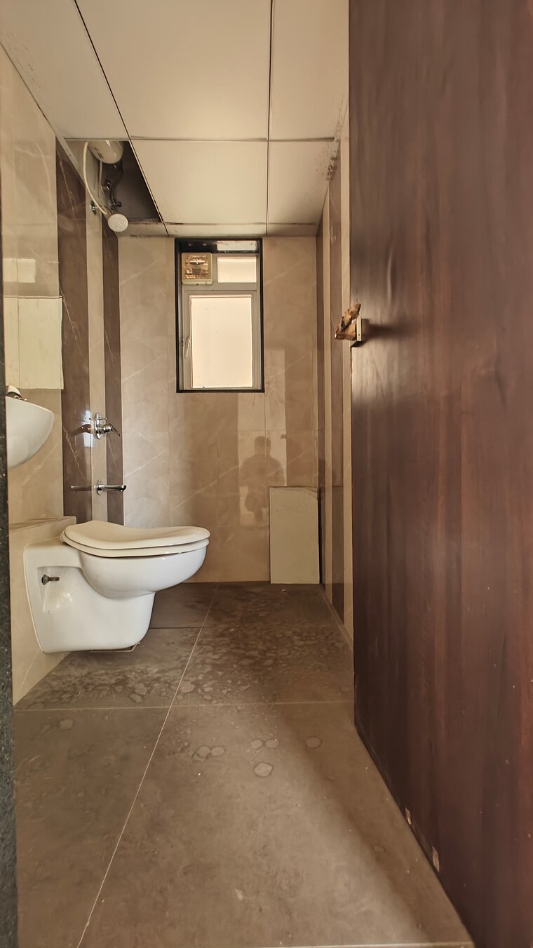Bathroom, paradigm-ananda-residency 2 Bedroom 665 Sq.Ft. Apartment In Borivali West Mumbai 8624770