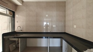 Kitchen in 2 BHK Apartment at Paradigm Ananda Residency, Borivali West – for Sale