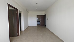 Room in 2 BHK Apartment at Paradigm Ananda Residency, Borivali West – for Sale
