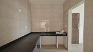 Kitchen in 2 BHK Apartment at Paradigm Ananda Residency, Borivali West – for Sale