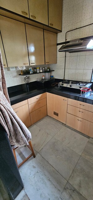 Kitchen in 2 BHK Apartment at Vikash Complex CHS, Thane West – for Sale