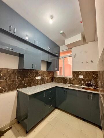 Kitchen in 3 BHK Apartment at Amrapali Riverview, Amrapali Leisure Valley – for Rent