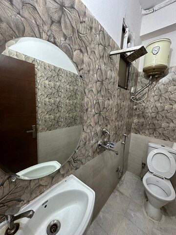 Bathroom in 3 BHK Apartment at Gaur Atulyam, Omicron I Greater Noida – for Rent