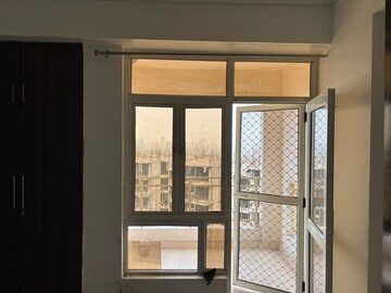 Room in 2 BHK Apartment at Shri Radha Sky Gardens, Sector 16b Greater Noida – for Rent