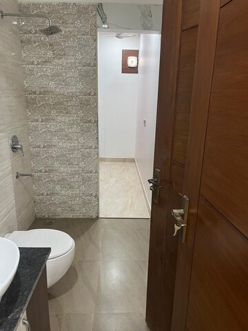Bathroom in 3 BHK Apartment at Shapoorji Pallonji Joyville Phase 2, Sector 102 – for Rent