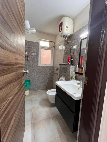 Bathroom in 3 BHK Apartment at Orris Aster Court Premier, Sector 85 – for Sale