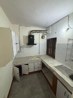 Kitchen in 2 BHK Apartment at Himagiri Apartments, Sector 34 – for Sale