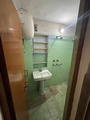 Bathroom in 2 BHK Apartment at Himagiri Apartments, Sector 34 – for Sale