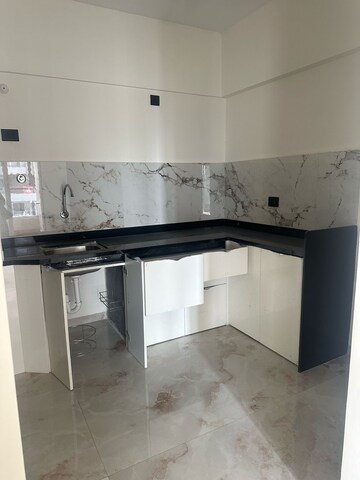Kitchen in 2 BHK Apartment at Casa Vibrante, Pisoli – for Sale