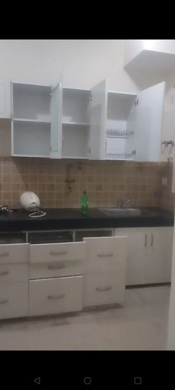 Kitchen in 3 BHK Apartment at Mahagun Mywoods, Sector 16c Greater Noida – for Rent