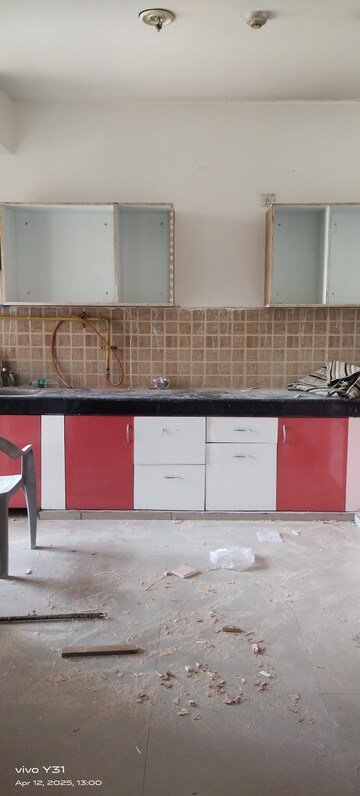 Kitchen in 3 BHK Apartment at Mahagun Mywoods, Sector 16c Greater Noida – for Rent