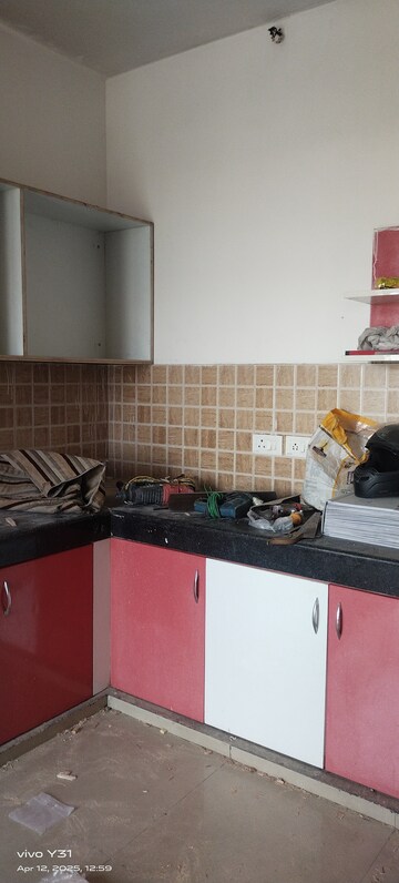 Kitchen in 3 BHK Apartment at Mahagun Mywoods, Sector 16c Greater Noida – for Rent