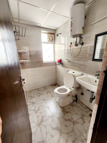 Bathroom in 3 BHK Apartment at Amrapali Leisure Park, Amrapali Leisure Valley – for Rent