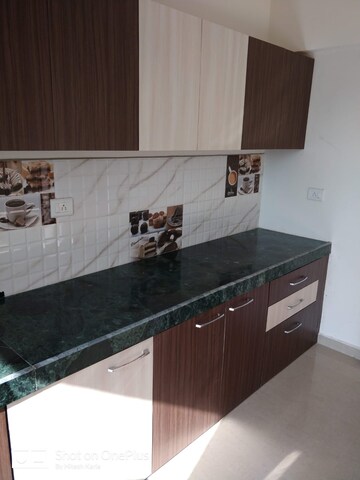 Kitchen in 2 BHK Apartment at Man Opus, Mira Road – for Sale