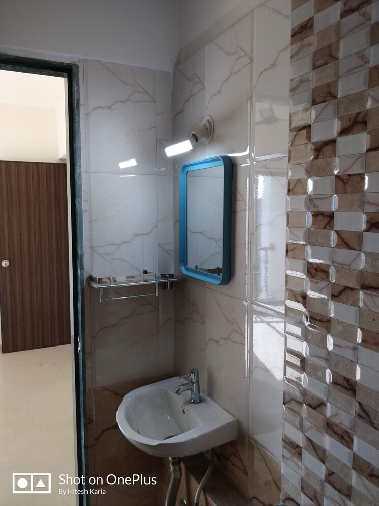 Bathroom, man-opus 2 Bedroom 692 Sq.Ft. Apartment In Mira Road Thane 8626803