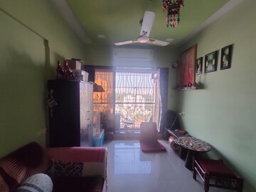 Living Room in 1 BHK Apartment at Charkop Sector 5 – for Sale