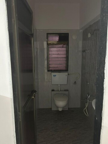 Bathroom in 1 BHK Apartment at Balaji Summer Set, Kandivali West – for Sale