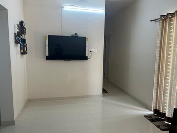 Living Room in 2 BHK Apartment at Godrej Rejuve, Mundhwa – for Rent