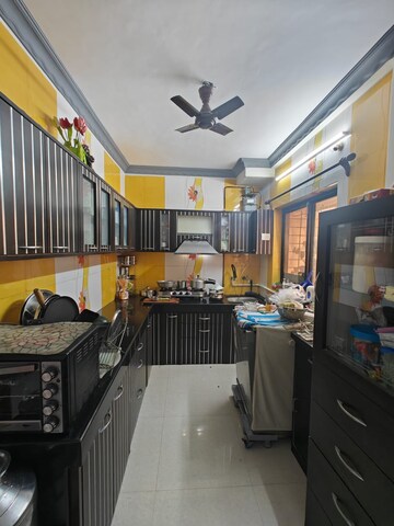 Kitchen in 1 BHK Apartment at Cosmos Lounge, Manpada – for Rent