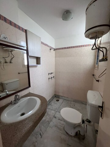 Bathroom in 4 BHK Apartment at Tarika CGHS, Sector 43 – for Rent