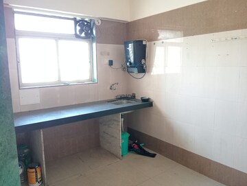 Kitchen in 1 BHK Builder Floor at Bindra Complex, Andheri East – for Sale