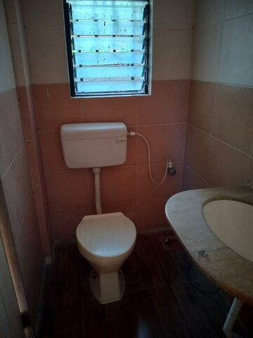 Bathroom in 2 BHK Apartment at Anshul Shree Hans Garden, Dhanori – for Rent